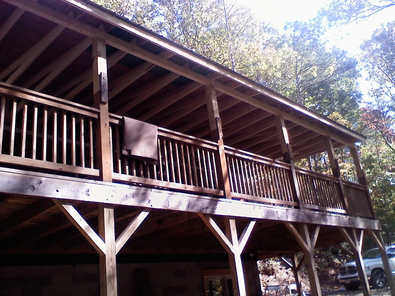 Timber framing under a new elevated porch and deck — Roof Leak Repair in Gadsden by Roofing Brothers